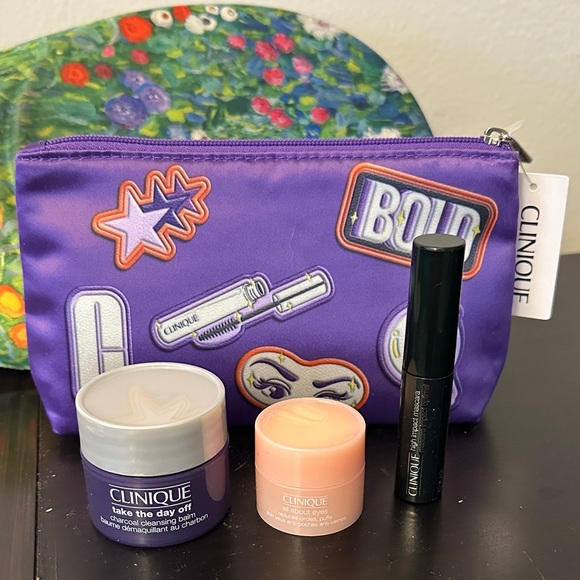 Clinique Other - CLINIQUE Beauty Gift Set with Purple Satin Bag
